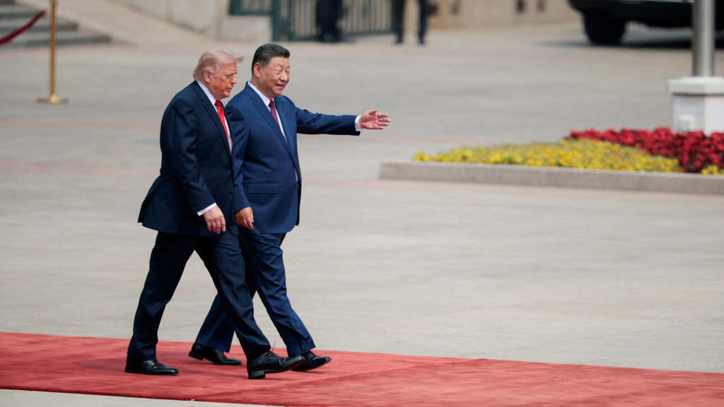 2026年5月14日,美国总统唐纳德·特朗普与中国国家主席习近平并肩而行走向北京人民大会堂。 2026年5月14日,美国总统唐纳德·特朗普与中国国家主席习近平并肩而行走向北京人民大会堂。